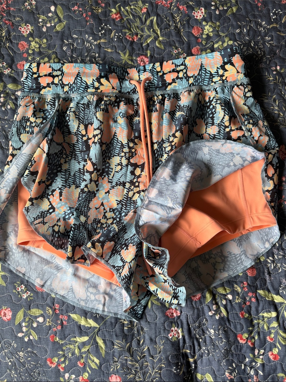Senita Athletics Floral Print Athletic Shorts with Peach Liner